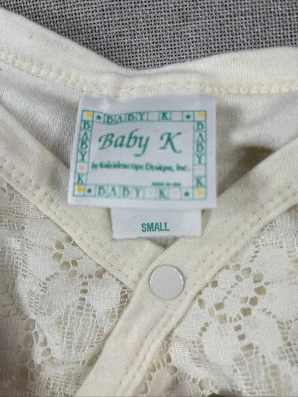Baby K Kaleidoscope Designs Size small Short Sleeve Romper Off White Floral Lace